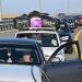 Легковые автомобили на Крымском мосту. Туристы везут с собой запасы бензина, маскируя топливо в нестандартную тару.